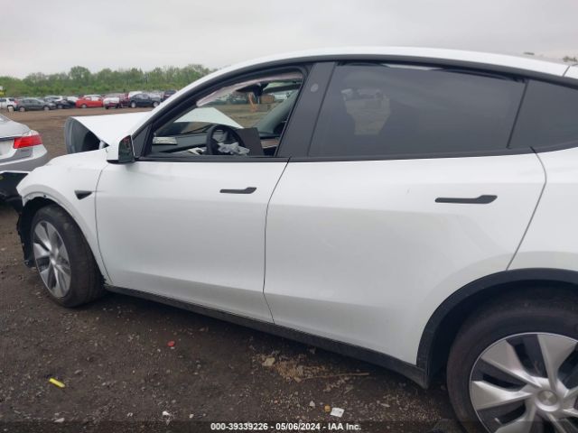 7SAYGDEE7RF989054 Tesla Model Y Long Range Dual Motor All-wheel Drive