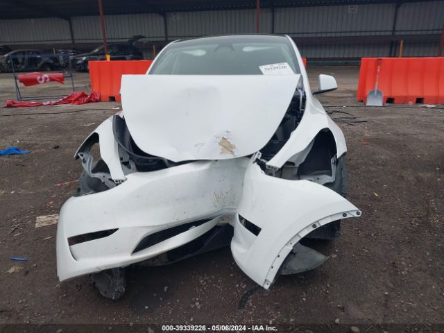 7SAYGDEE7RF989054 Tesla Model Y Long Range Dual Motor All-wheel Drive