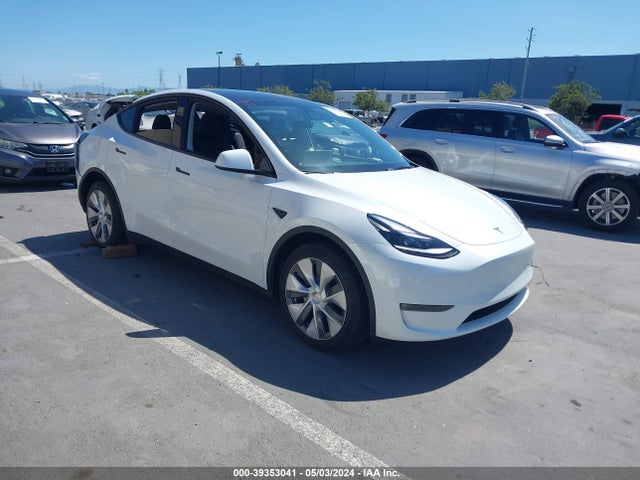 2023 TESLA MODEL Y 7SAYGDEE7PF864472 Photo 0
