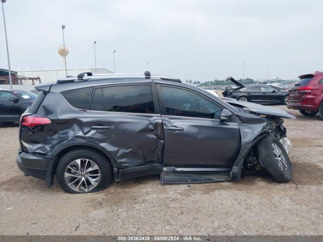 JTMRJREV8JD214628 Toyota Rav4 Hybrid Xle