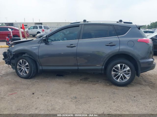 JTMRJREV8JD214628 Toyota Rav4 Hybrid Xle