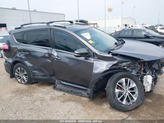 JTMRJREV8JD214628 Toyota Rav4 Hybrid Xle