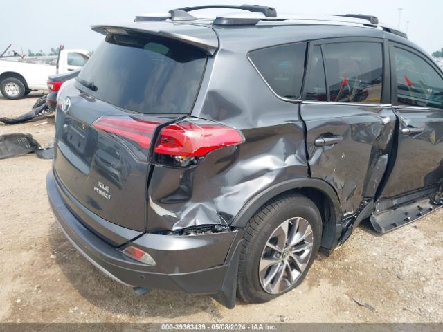 JTMRJREV8JD214628 Toyota Rav4 Hybrid Xle