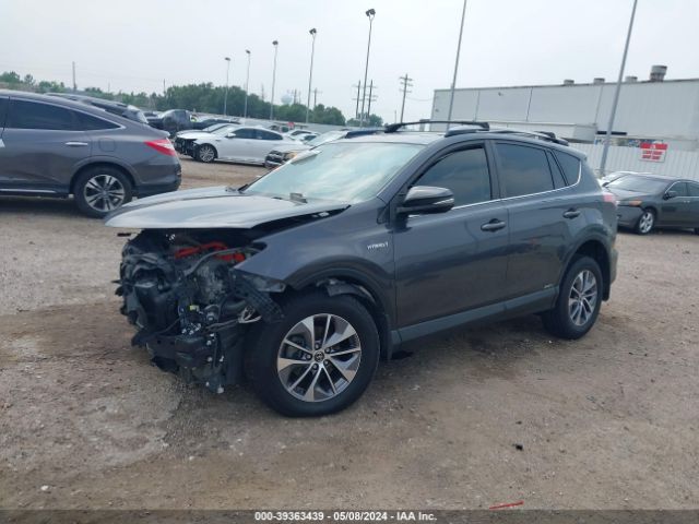 JTMRJREV8JD214628 Toyota Rav4 Hybrid Xle