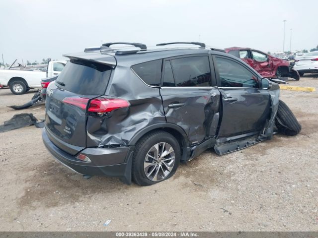 JTMRJREV8JD214628 Toyota Rav4 Hybrid Xle