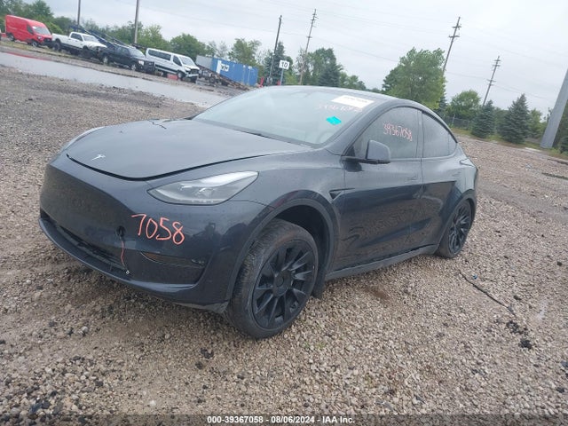 2024 TESLA MODEL Y 7SAYGDEE1RA228680 Photo 1