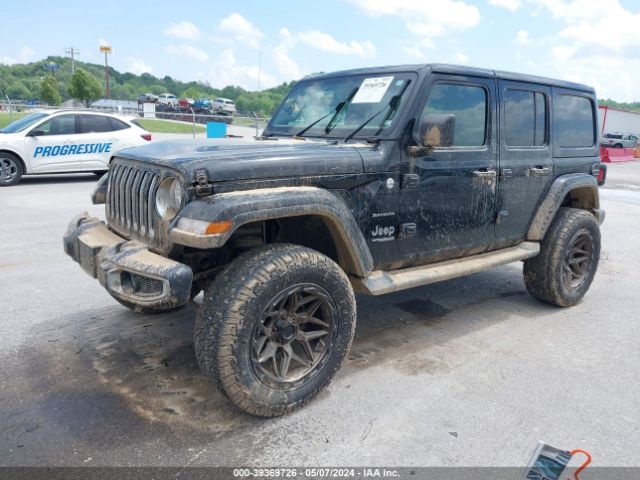 1C4HJXEGXJW321945 Jeep Wrangler Unlimited Sahara