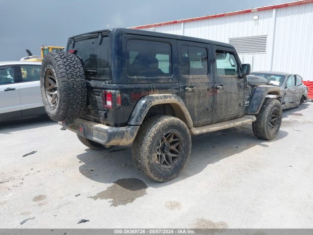 1C4HJXEGXJW321945 Jeep Wrangler Unlimited Sahara