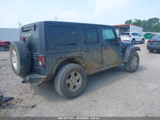 1C4BJWDG1GL266202 Jeep Wrangler Unlimited Sport