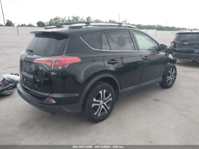 2T3ZFREV9GW259638 Toyota RAV4 LE