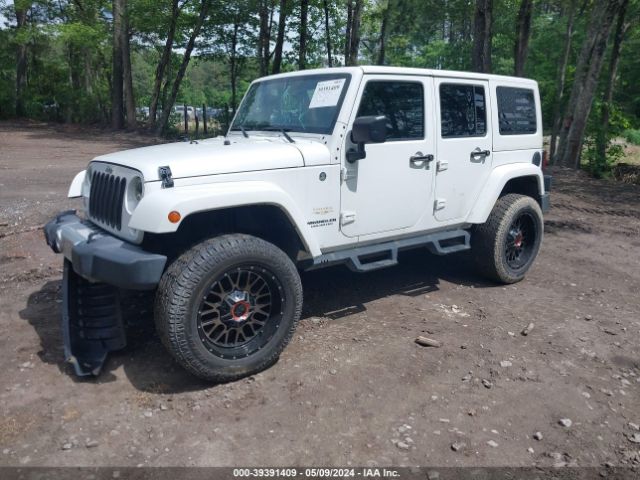 1C4BJWEG8EL258898 Jeep Wrangler Unlimited Sahara