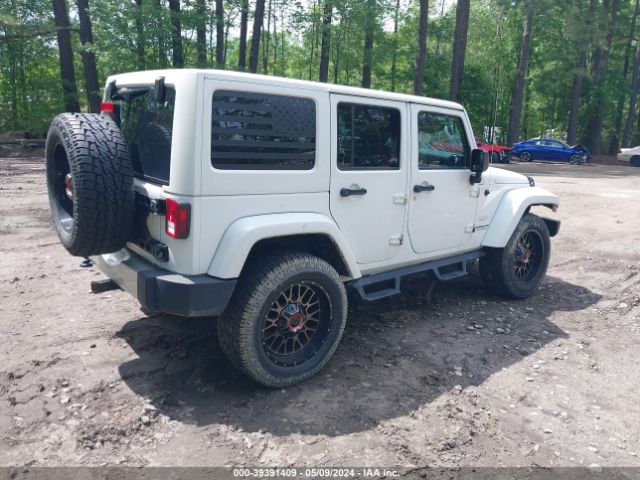 1C4BJWEG8EL258898 Jeep Wrangler Unlimited Sahara