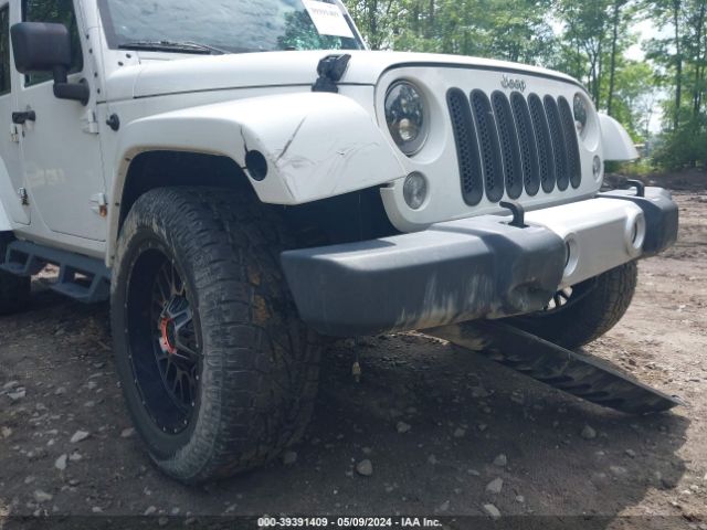1C4BJWEG8EL258898 Jeep Wrangler Unlimited Sahara