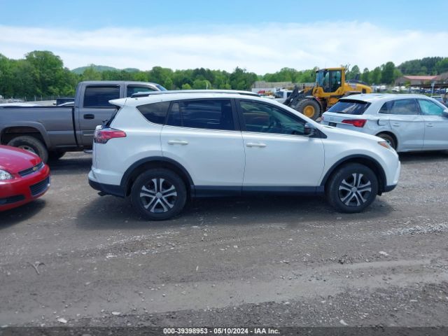 JTMBFREV0JJ239284 Toyota RAV4 LE