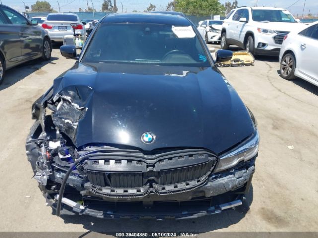 WBA5R1C54KAK09115 BMW 330I