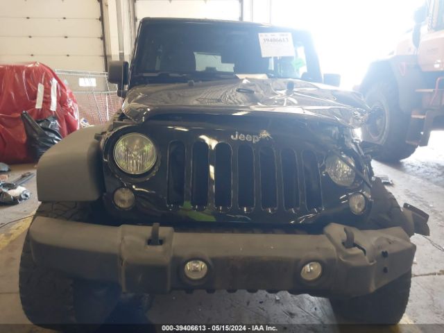 1C4BJWDG0EL192123 Jeep Wrangler Unlimited Sport