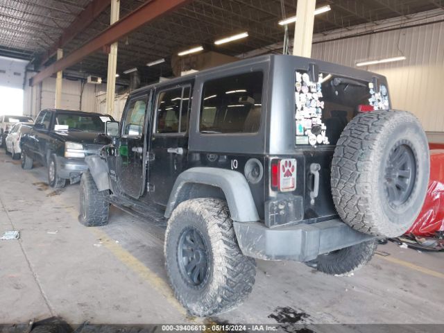 1C4BJWDG0EL192123 Jeep Wrangler Unlimited Sport