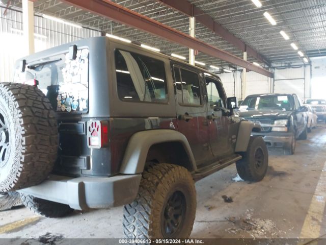 1C4BJWDG0EL192123 Jeep Wrangler Unlimited Sport