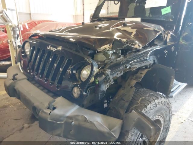1C4BJWDG0EL192123 Jeep Wrangler Unlimited Sport