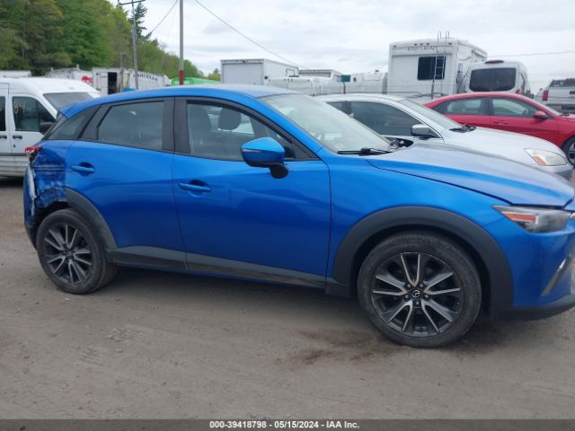 JM1DKFC79H0158534 Mazda Cx-3 Touring