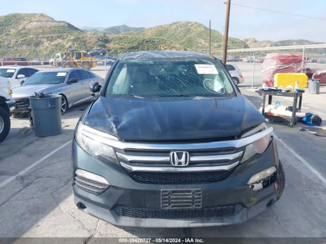 5FNYF6H11GB082575 Honda PILOT LX