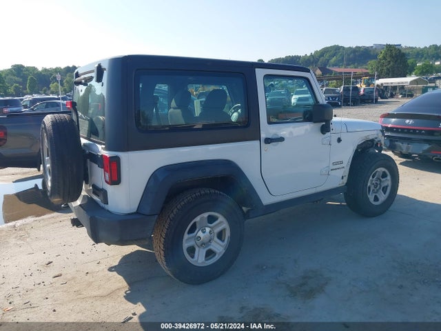 1C4AJWAG9GL105662 Jeep Wrangler Sport