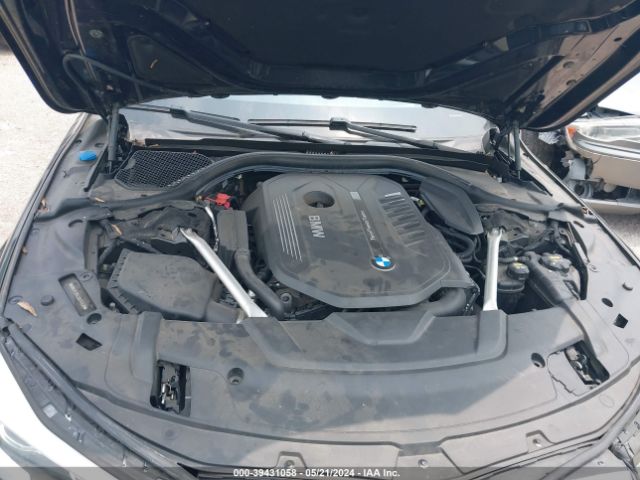 WBA7E2C53JB214938 BMW 740I