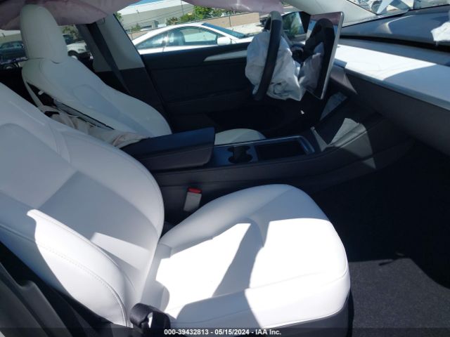 2023 TESLA MODEL Y 7SAYGDEF1PF737791 Photo 4