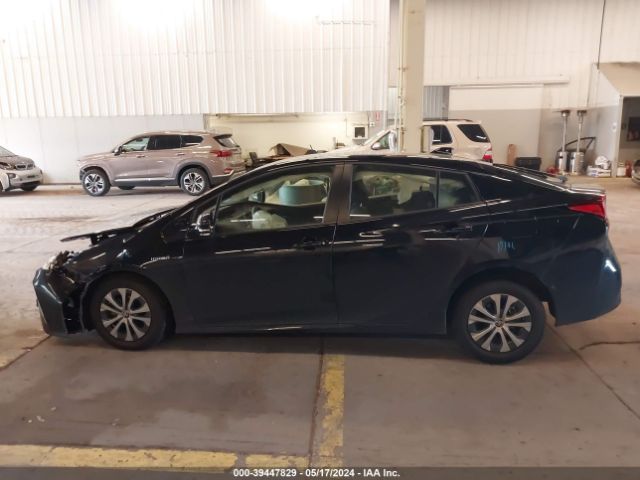 JTDL9RFU0L3020544 Toyota Prius Le Awd-e