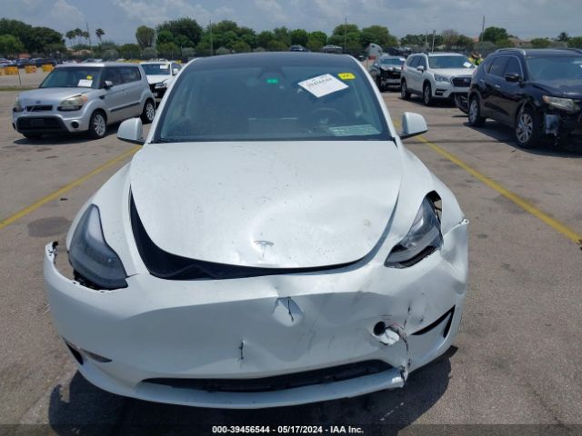 7SAYGDED1RF047637 Tesla Model Y Rwd