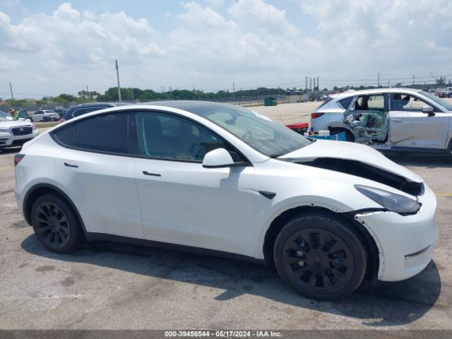 7SAYGDED1RF047637 Tesla Model Y Rwd