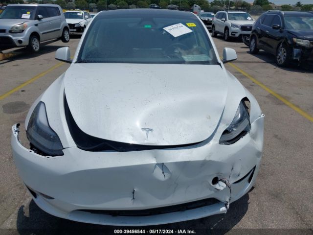 7SAYGDED1RF047637 Tesla Model Y Rwd