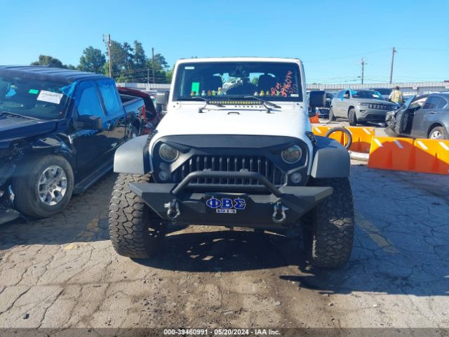 1C4BJWDG4GL119856 Jeep Wrangler Unlimited Sport