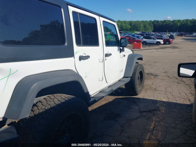 1C4BJWDG4GL119856 Jeep Wrangler Unlimited Sport