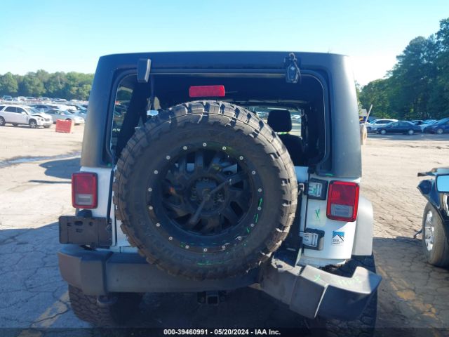 1C4BJWDG4GL119856 Jeep Wrangler Unlimited Sport