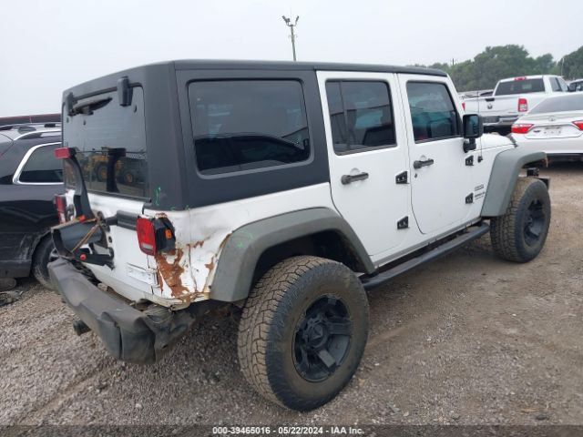 1C4BJWDG8EL117492 Jeep Wrangler Unlimited Sport