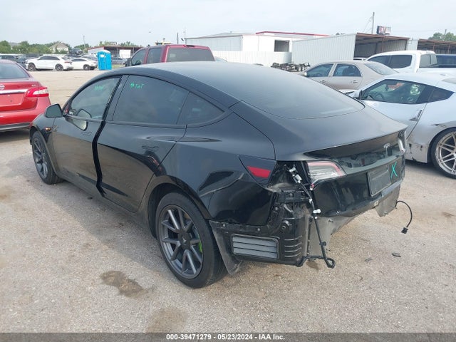 5YJ3E1EA1MF982828 Tesla Model 3 Standard Range Plus Rear-wheel Drive