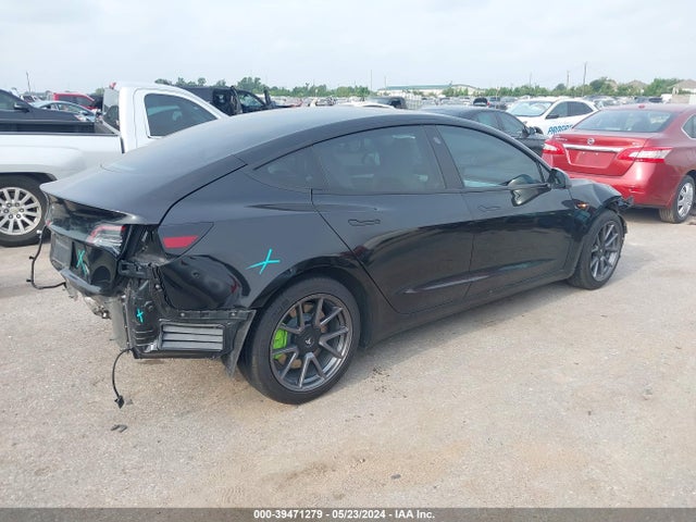 5YJ3E1EA1MF982828 Tesla Model 3 Standard Range Plus Rear-wheel Drive