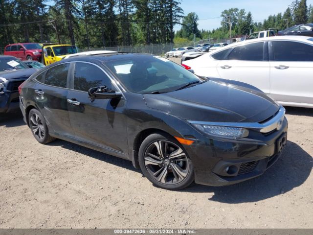 Auction sale of the 2017 Honda Civic Touring, vin: 2HGFC1F90HH638030, lot number: 39472636