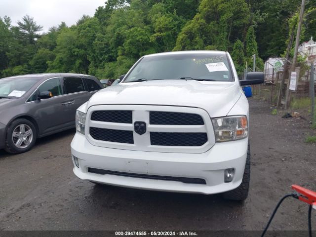 1C6RR7FG7KS504120 RAM 1500 Classic Express Quad Cab 4x4 6'4 Box