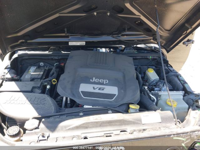 1C4BJWDG9EL309584 Jeep Wrangler Unlimited Sport