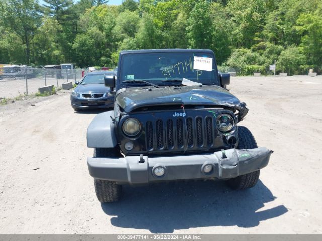 1C4BJWDG9EL309584 Jeep Wrangler Unlimited Sport