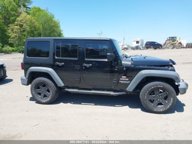 1C4BJWDG9EL309584 Jeep Wrangler Unlimited Sport