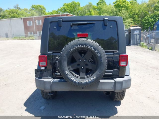 1C4BJWDG9EL309584 Jeep Wrangler Unlimited Sport