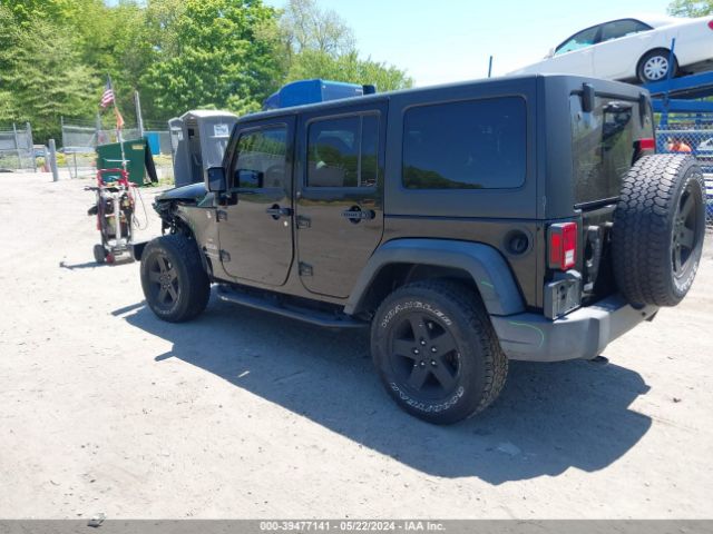 1C4BJWDG9EL309584 Jeep Wrangler Unlimited Sport