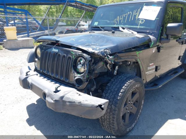 1C4BJWDG9EL309584 Jeep Wrangler Unlimited Sport