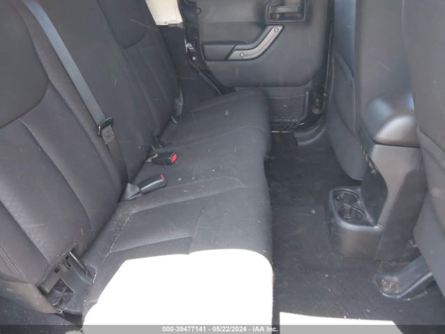 1C4BJWDG9EL309584 Jeep Wrangler Unlimited Sport