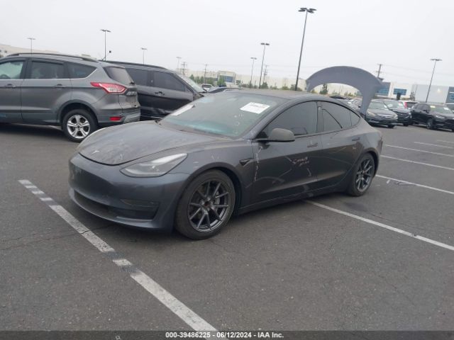 5YJ3E1EA5MF053077 Tesla Model 3 Standard Range Plus Rear-wheel Drive