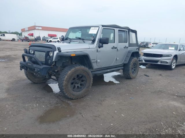 1C4BJWDG7EL102479 Jeep Wrangler Unlimited Sport