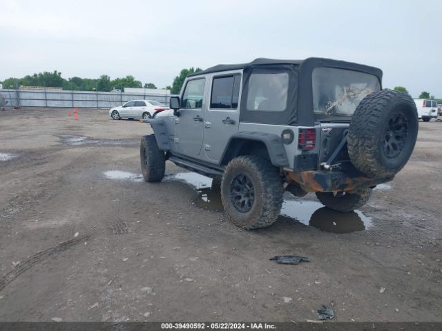 1C4BJWDG7EL102479 Jeep Wrangler Unlimited Sport